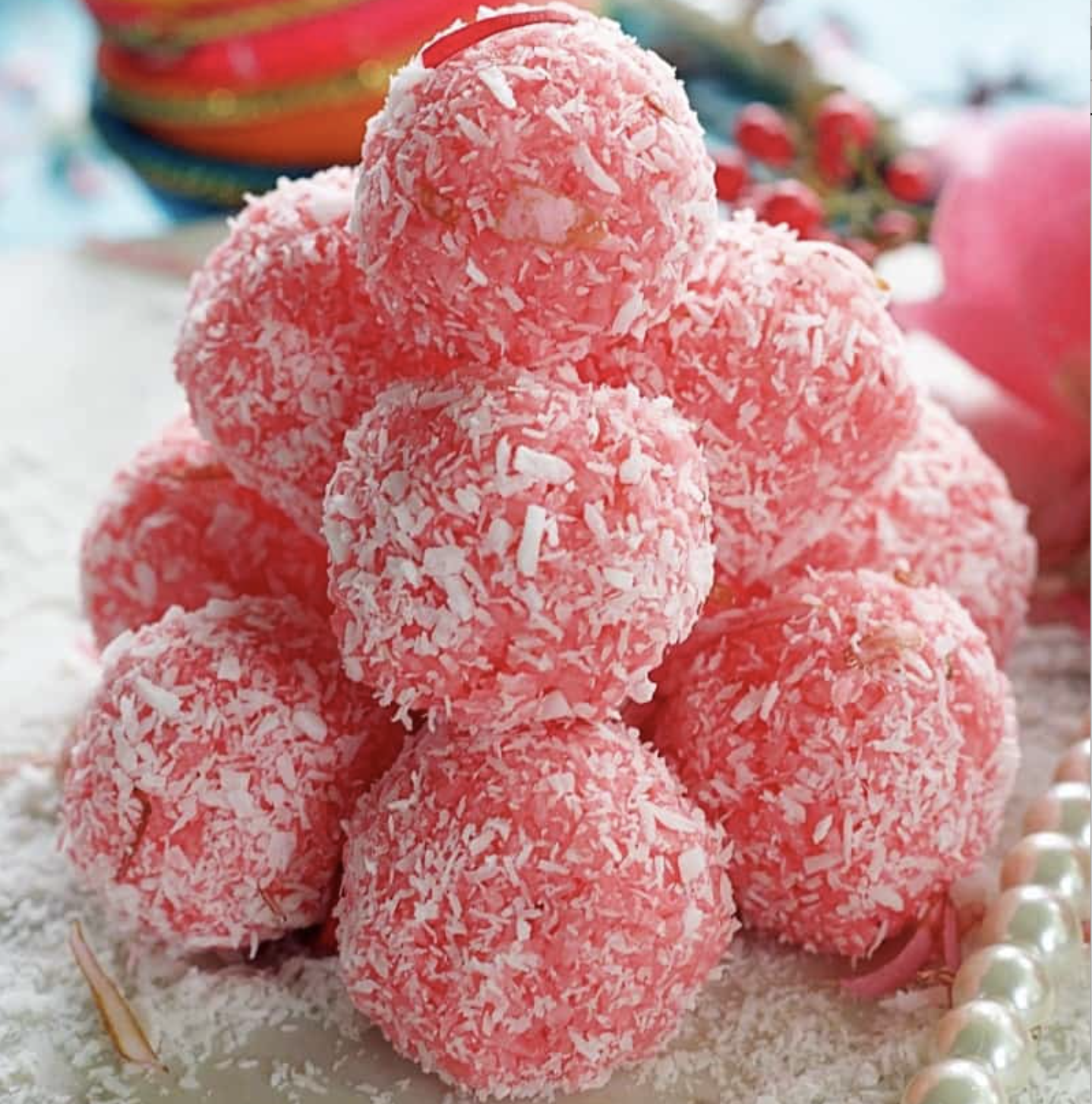 picture of rose coconut ladoo and the link to the recipe